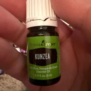 Young Living Kunzea Essential Oil in Green and White